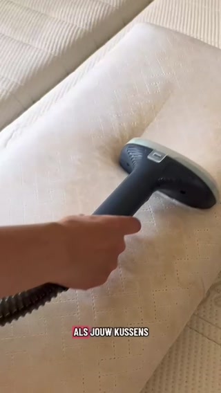 Vlekken reinigen met warm water en stoom functie