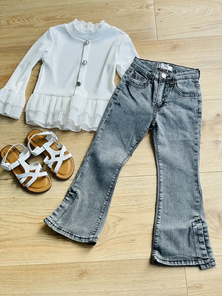 Blauwe spijker flared pants met een split aan de zijkant