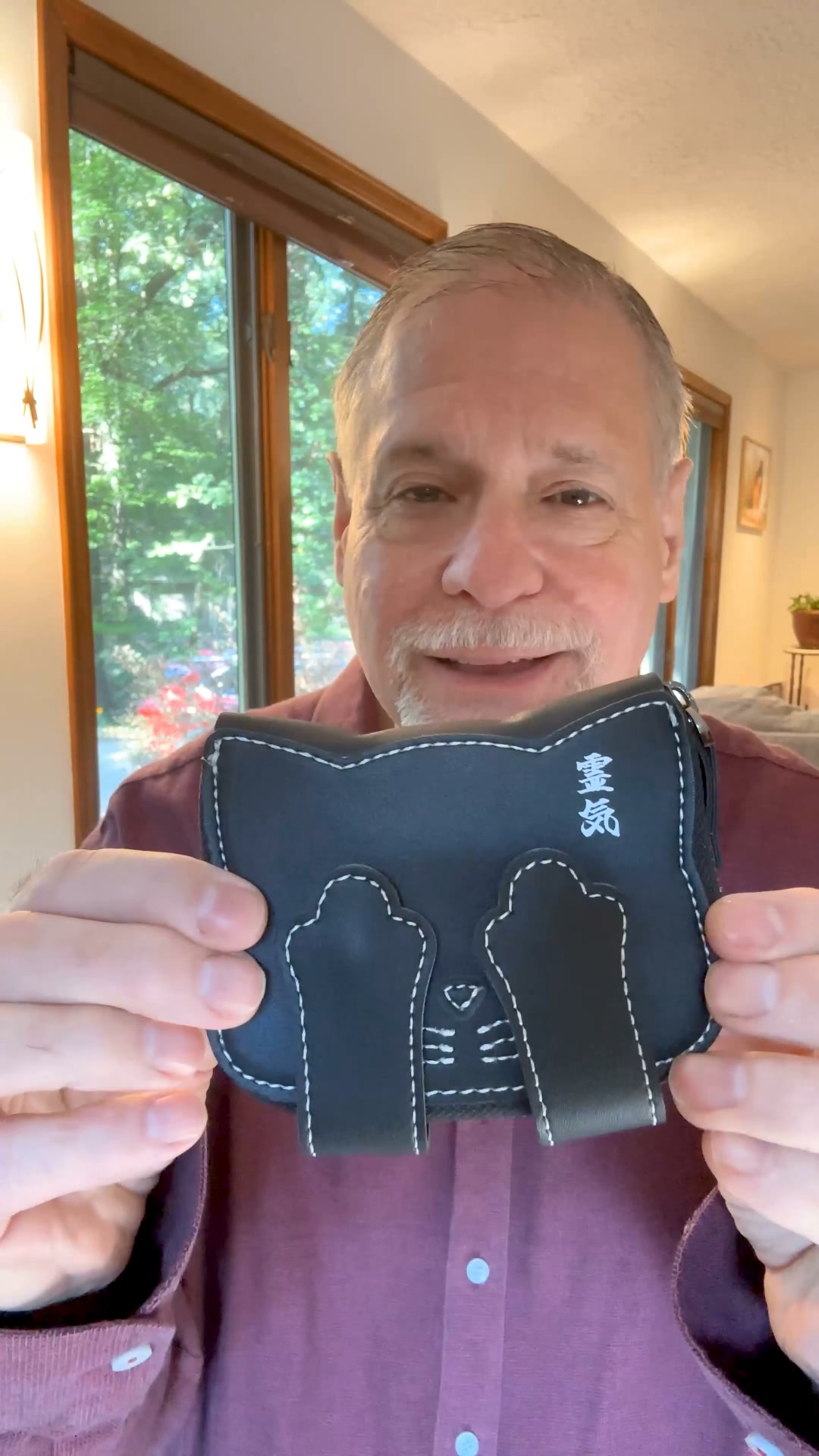 I got my niece this little Japanese cat wallet for her 10th birthday. She said she's never felt so grown-up in her life.