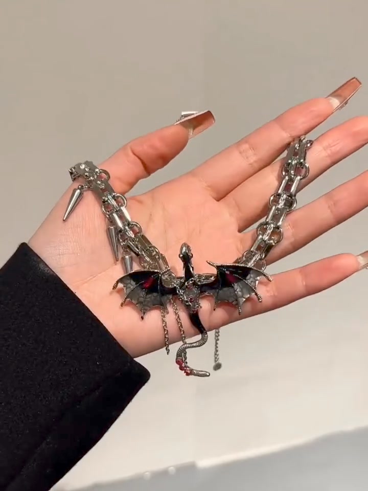 Imprisoned flying dragon necklace