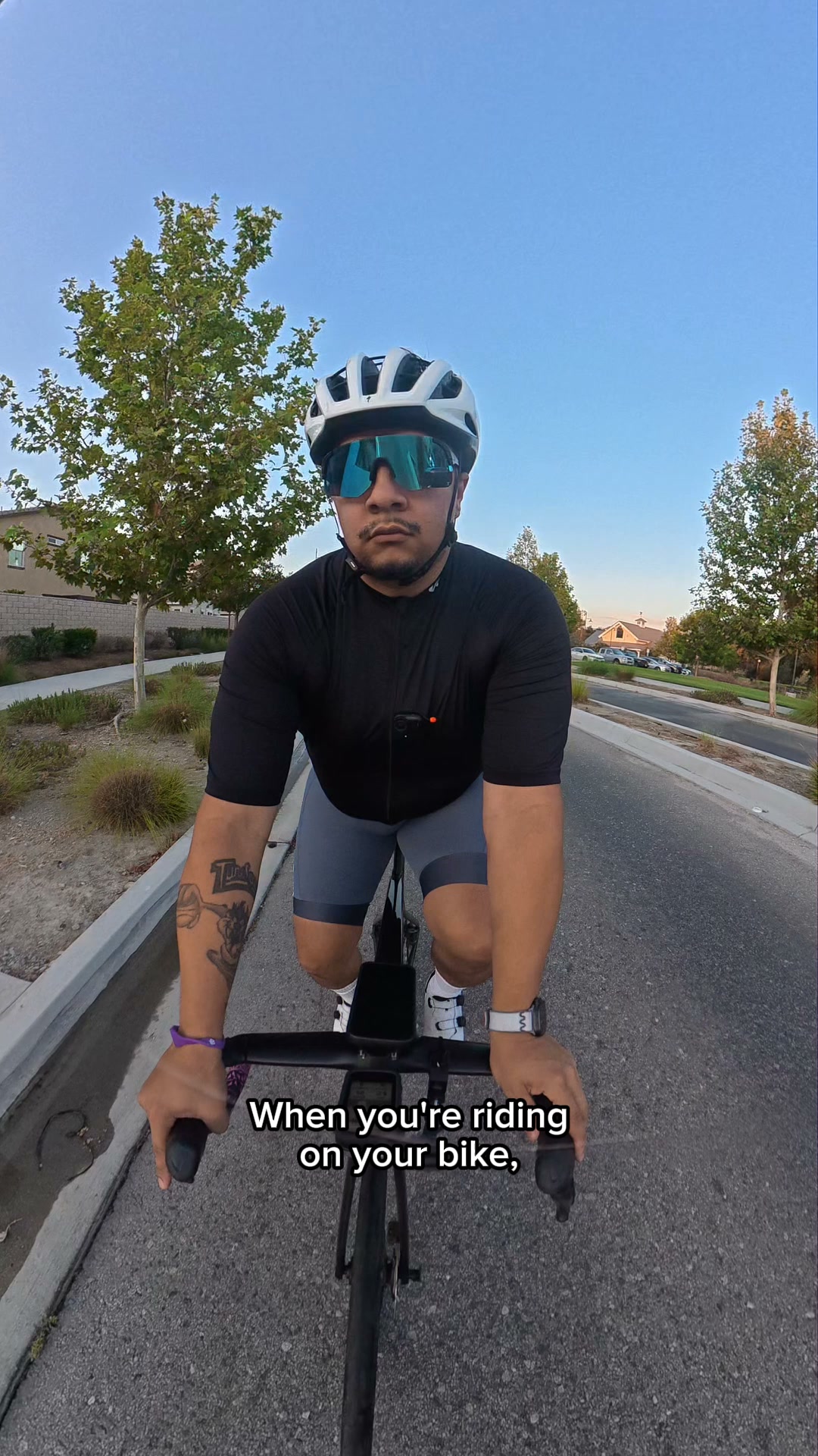 Eyewear with integrated rearview mirror