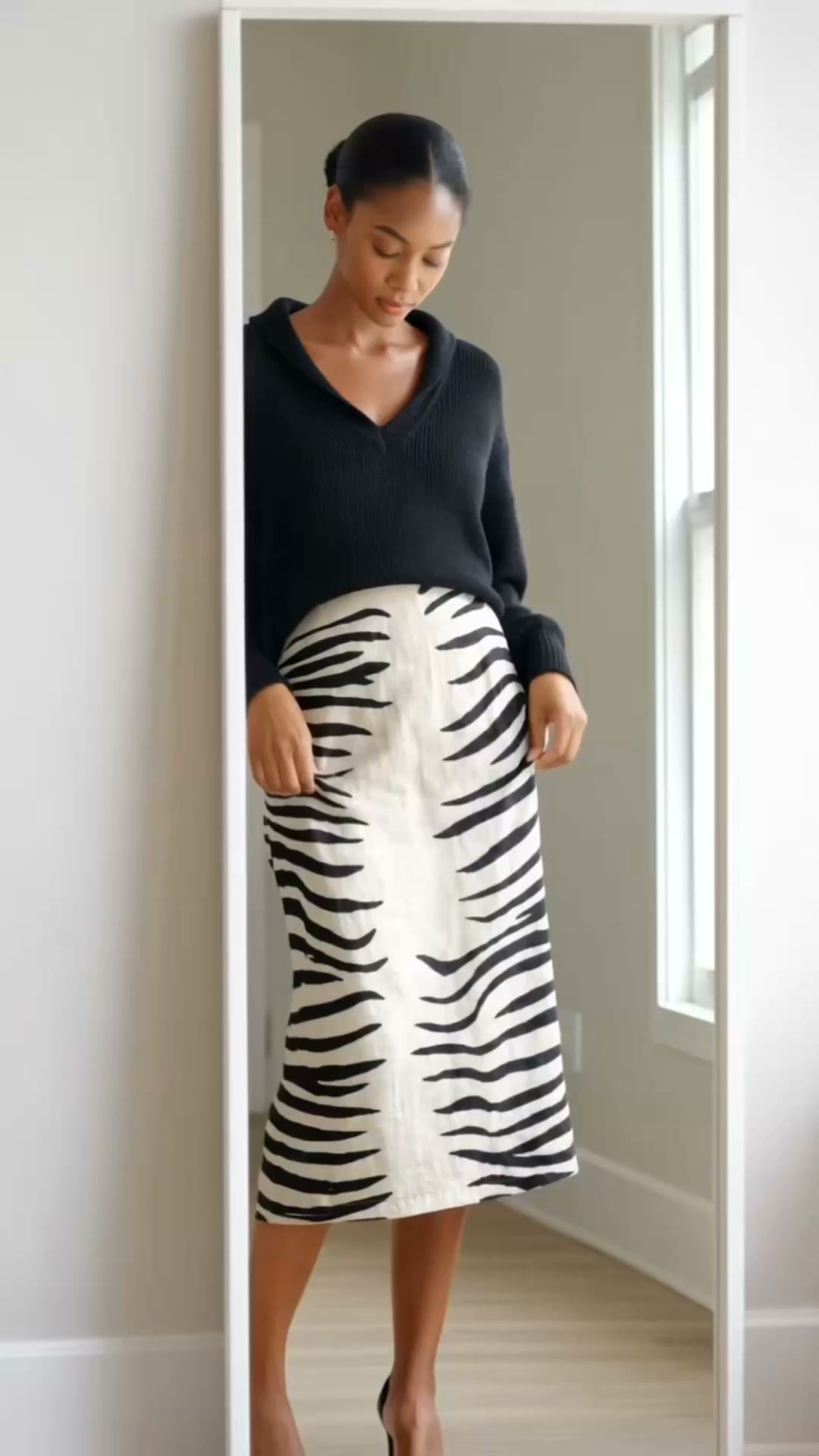 Conjunto de punto y falda midi con estampado cebra