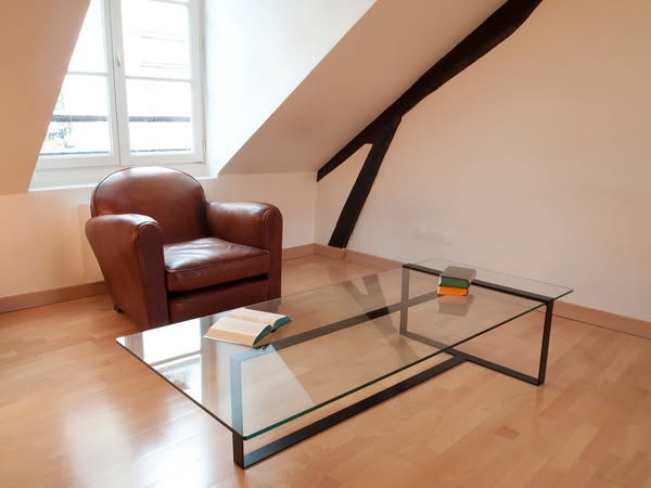 Table Basse Séverin verre et acier thermolaqué noir mat. Fait main en Europe. Livraison offerte.