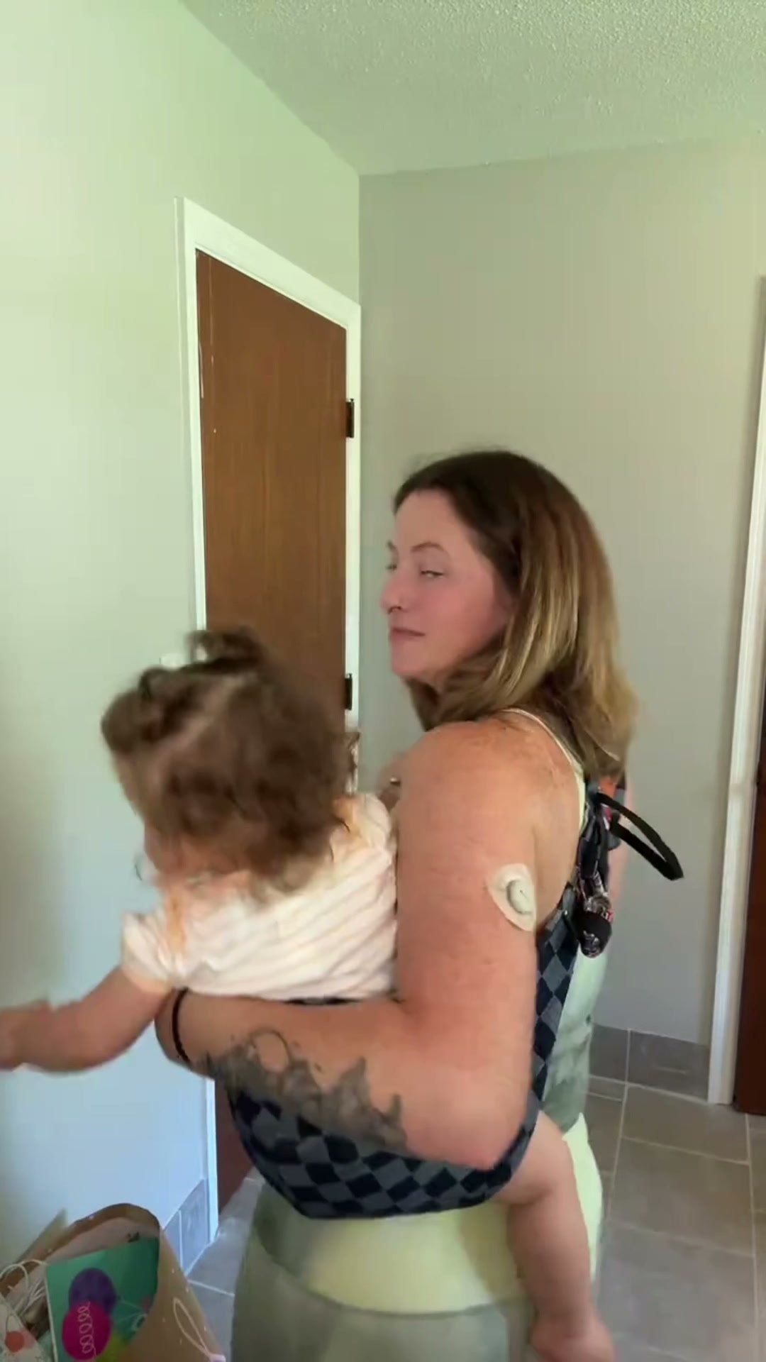 Keep Your Little One Close. Without the Back Pain!