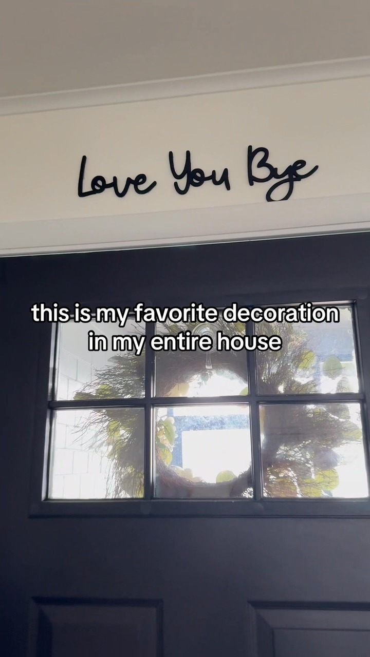 Love You Bye Sign Above Door