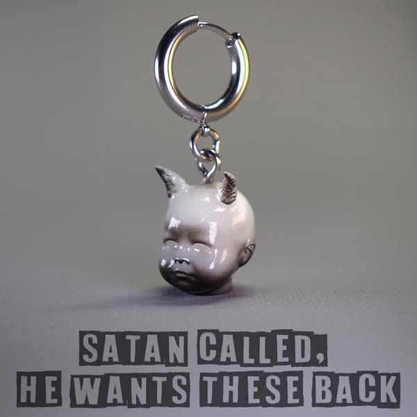 Cursed. Cute. Wearable.