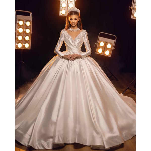 Long Sleeve White Ball Gown Private Sale. Limited Access.